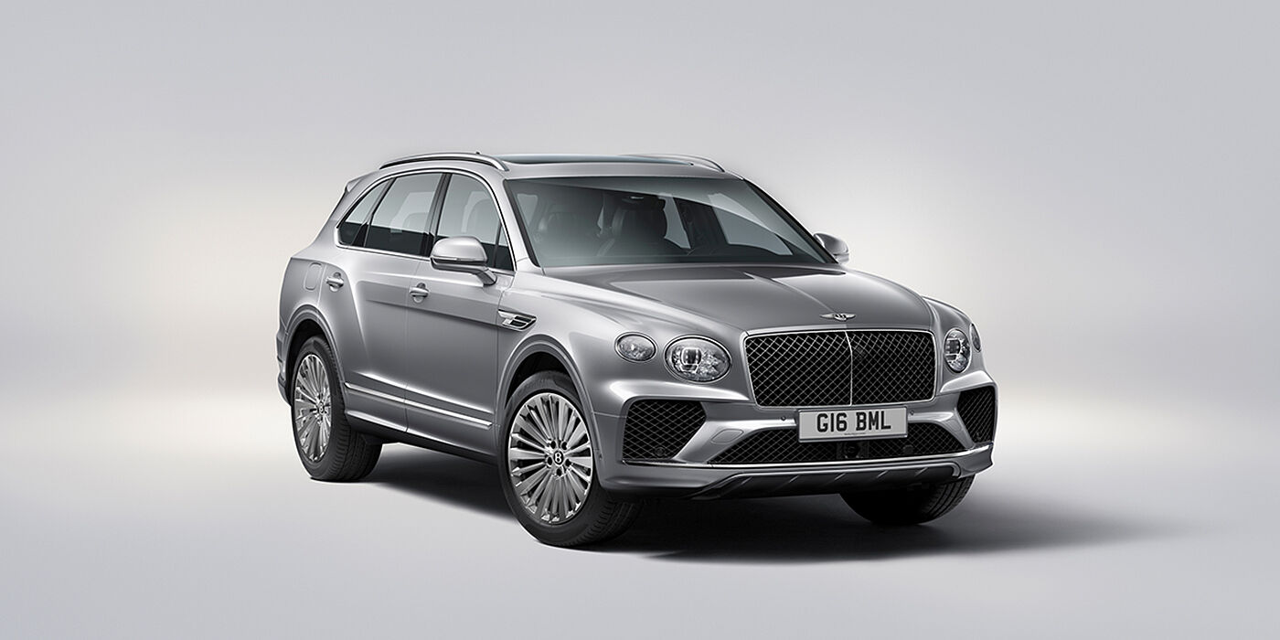 Bentley Tbilisi Bentley Bentayga luxury SUV front three quarter view in Moonbeam paint with matrix grille and 21″ 5 spoke painted wheels