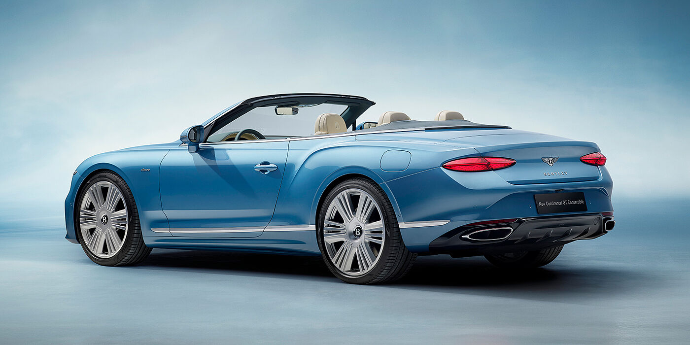 Bentley Tbilisi New Bentley Continental GTC Azure convertible rear view in Light Windsor blue paint with 22 inch ten spoke wheels and chrome exterior details